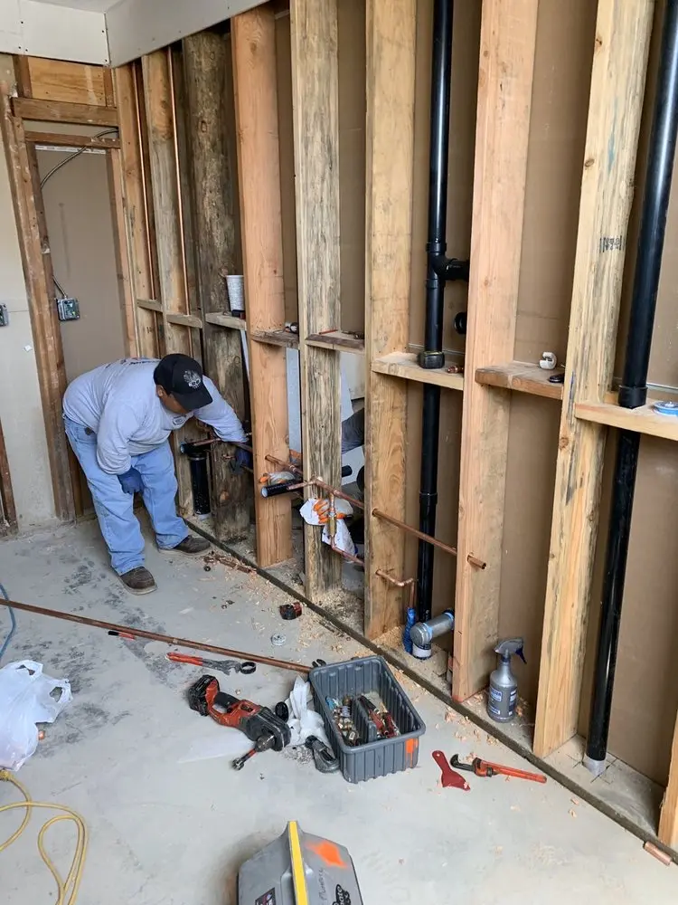 Commercial rough-in plumbing for Water Heater Replacement in Homes Mills